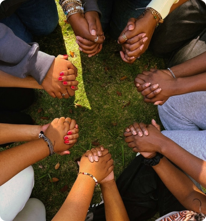 Group holding hands in a circle